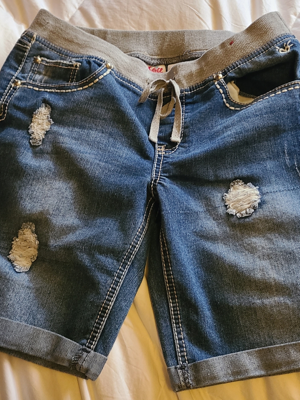 Justice light blue denim shorts with grey waistband